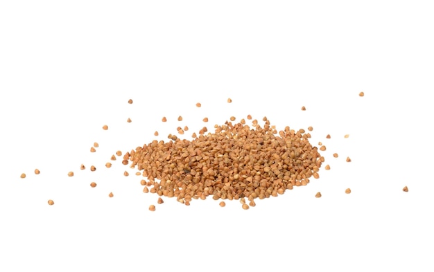 Heap of uncooked buckwheat grains. Groats