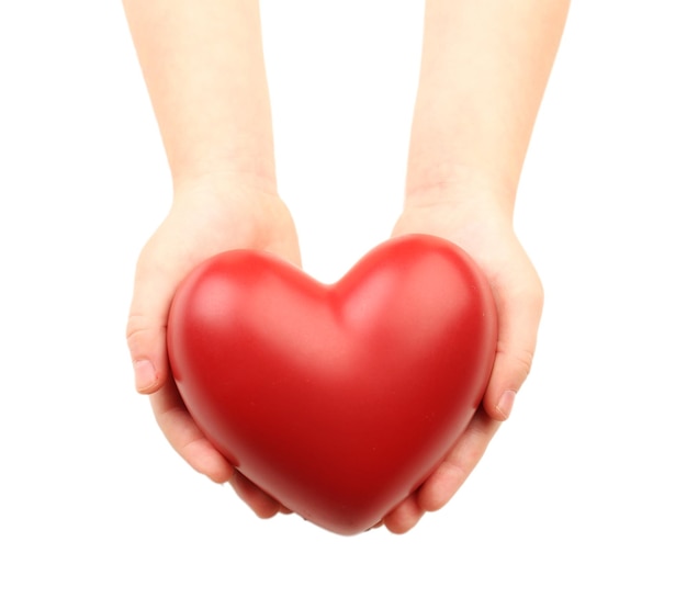 Heart in child hands isolated on white