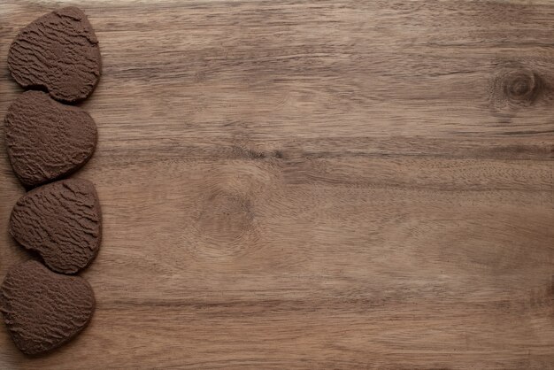 heart chocolate chip cookies on wooden table