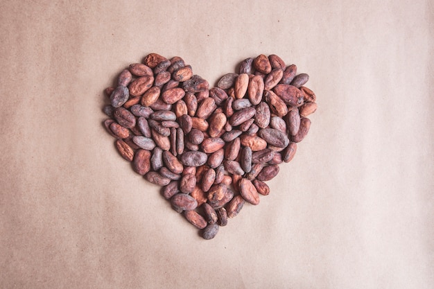 Photo heart of cocoa beans. aromatic cacao.