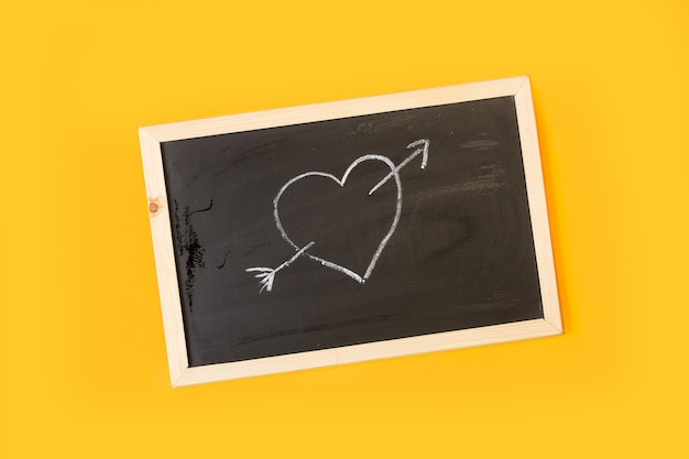 A heart drawed with chalk on a blackboard