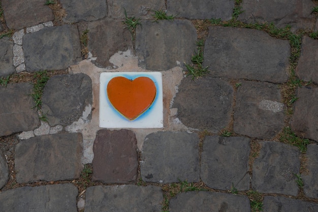 Heart encased in the pavement