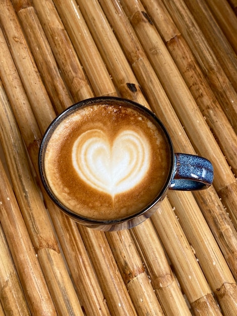 Heart latte art on coffee cup