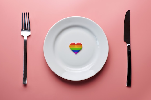 Heart in LGBT flag colors in plate