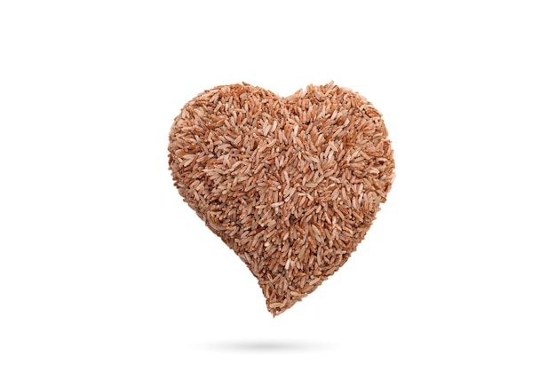 Heart organic brown rice on white isolated