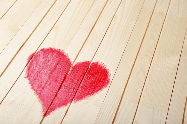 Heart painted on wooden wall