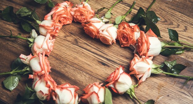 Heart roses  on the table background