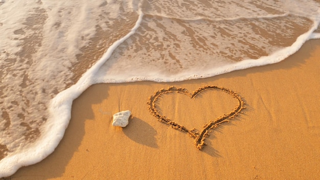 Heart on sea shore beach