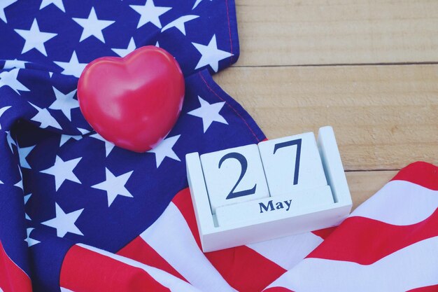 Photo heart shape balloon and date on american flag