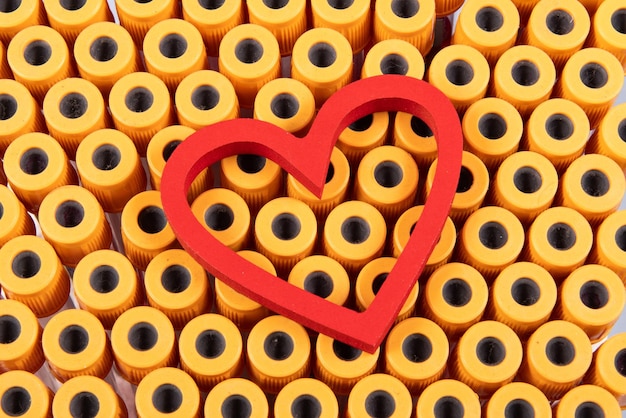 Photo heart shape over blood collection tubes