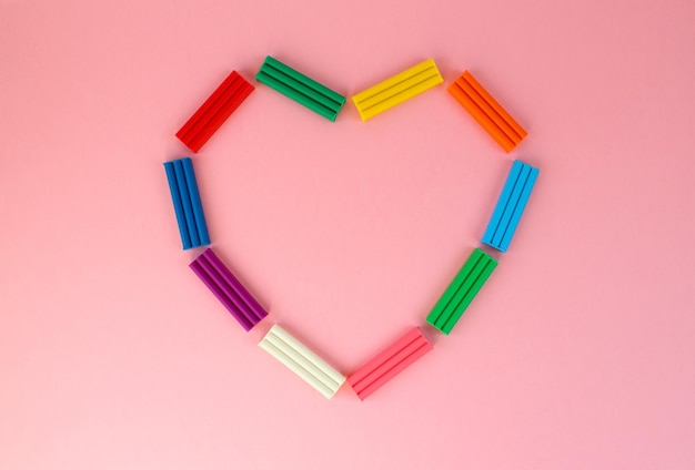 Heart shape made of bars of multicolored modeling clay