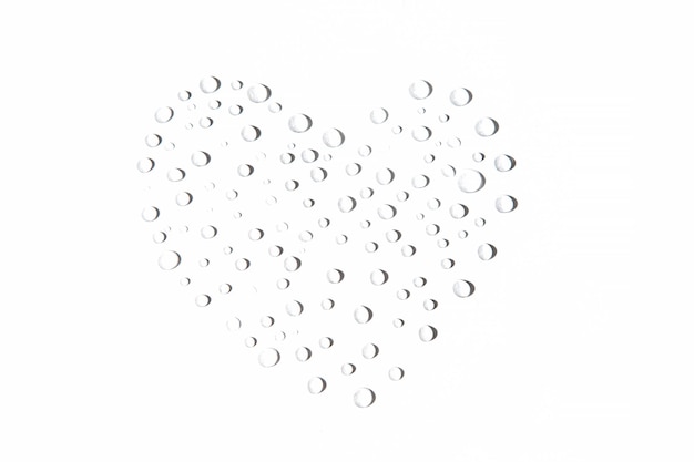Heart Shape Made of Water Drops on White Background