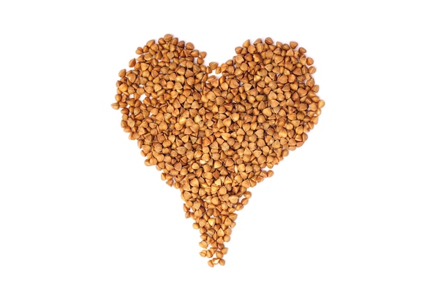 Heart shaped buckwheat isolated on white wall