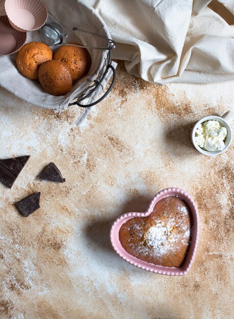 Photo heart-shaped cake in a pink baking dish