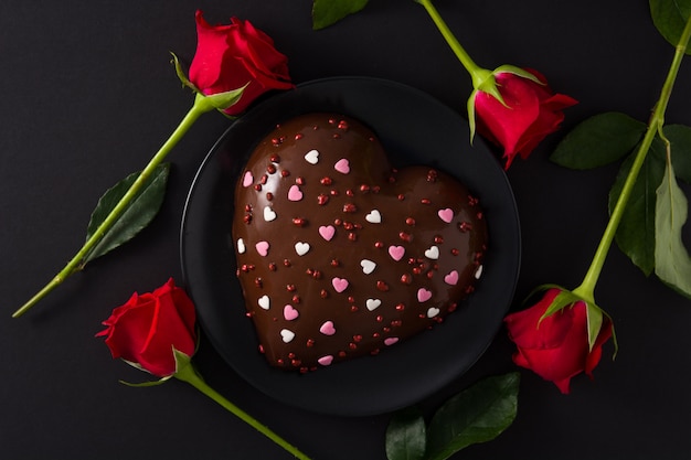 Heart shaped cake and red rose for Valentine's Day