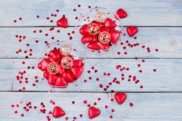 heart shaped candy in glasses