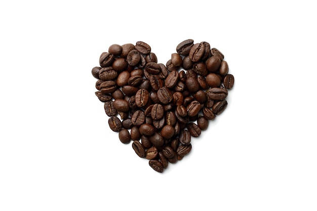 Heart shaped coffee beans top view white isolated background