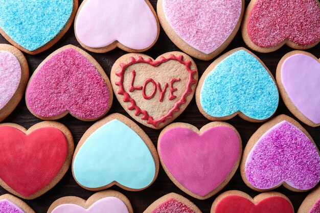 Heart shaped cookies background top view