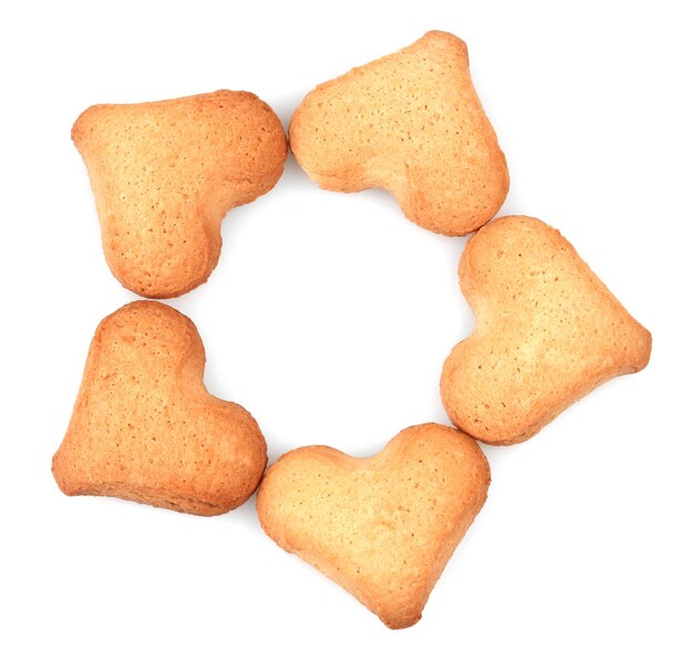 Foto biscotti a forma di cuore isolati su bianco