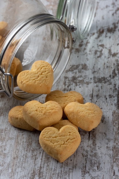 Photo heart shaped cookies on light rustic background