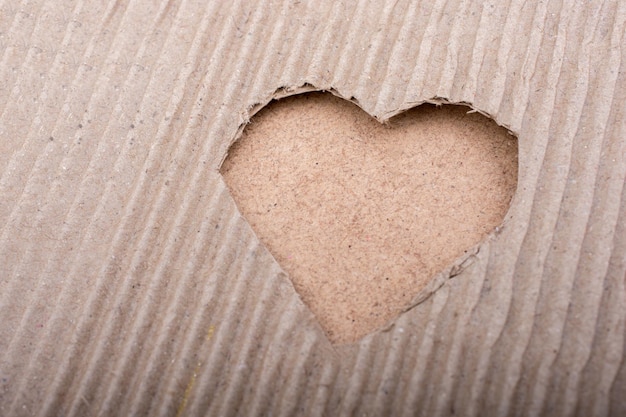 Heart shaped cut out of a cardboard