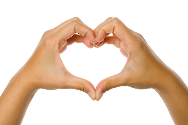 Photo heart shaped from woman hand isolated over white background