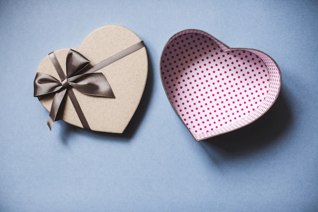 Heart shaped gift box on a blue background