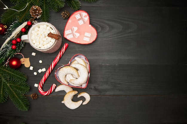 Heart shaped gift box full of traditional german or austrian vanillekipferl vanilla kipferl cookies