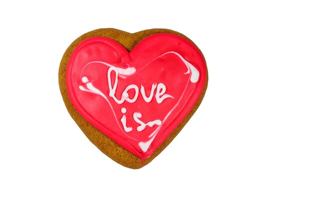 Photo heart shaped gingerbread cookie isolated on white background