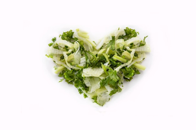 Heart shaped healthy green salad