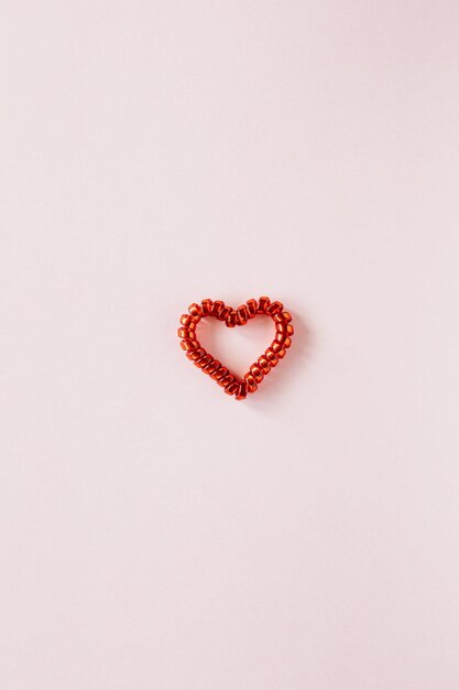 A heart shaped object with a heart that says " love ".