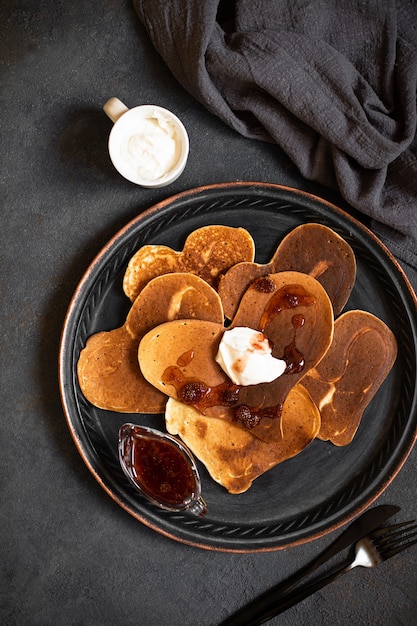 Heart-shaped pancakes with delicious jam