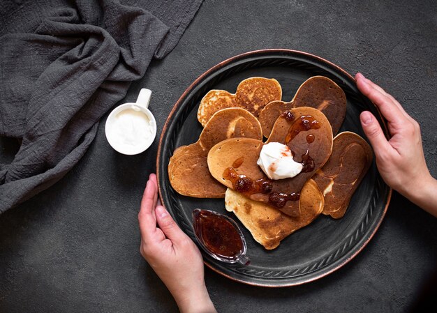 Heart-shaped pancakes with delicious jam