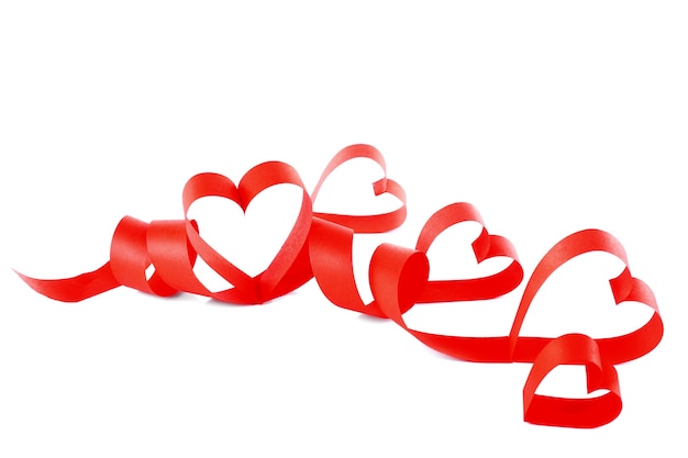 Photo heart shaped red paper ribbon isolated on white surface
