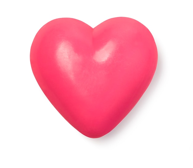 Heart-shaped soap on white