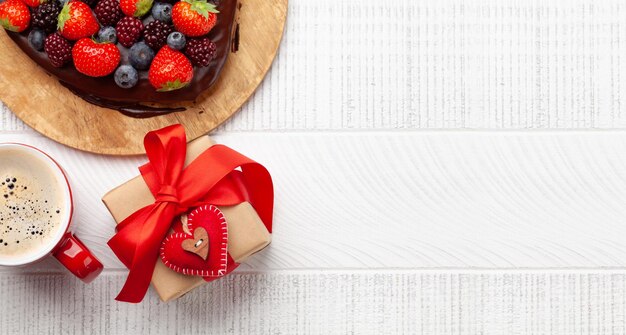 Heart shaped sweet cake with berries