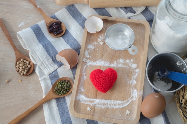 Heart shaped yarn on kitchen table