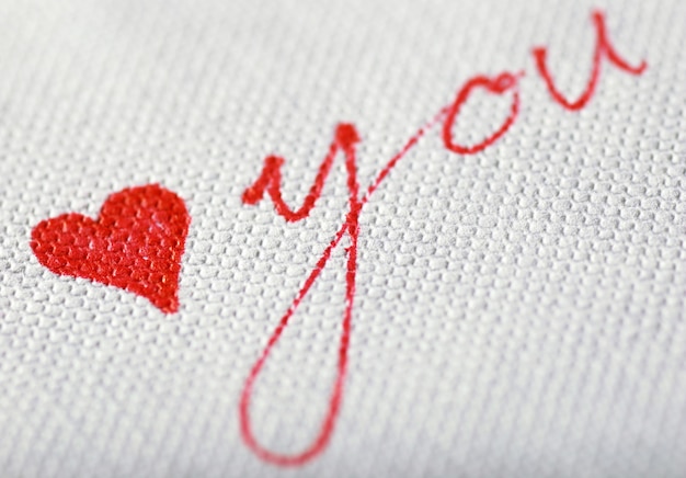 Heart on textured paper extreme close-up 