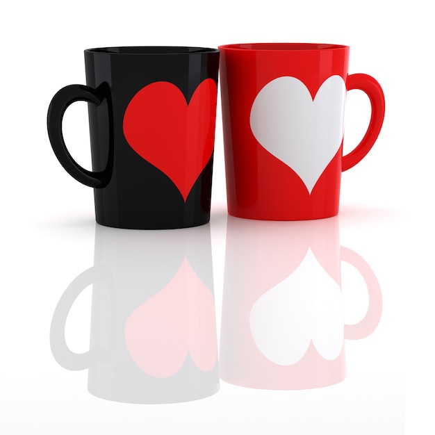 Heart on two mugs of coffee. Isolated on a white background.