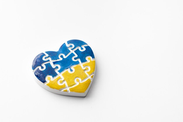 Heart with Ukrainian flag Concept of stop war and pray for Ukraine