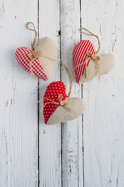 Hearts of fabric on a white table