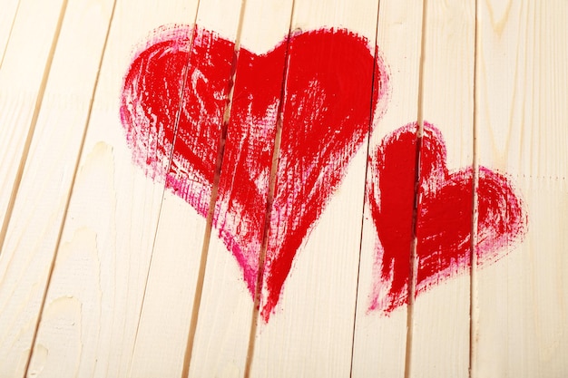 Hearts painted on wooden wall