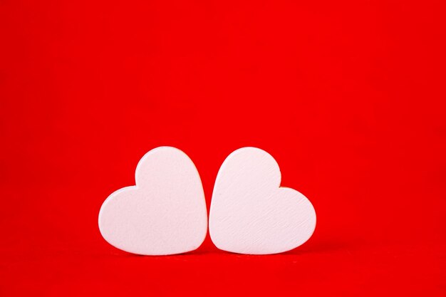 Photo hearts on a red background. valentine's day. selective focus. valentine.