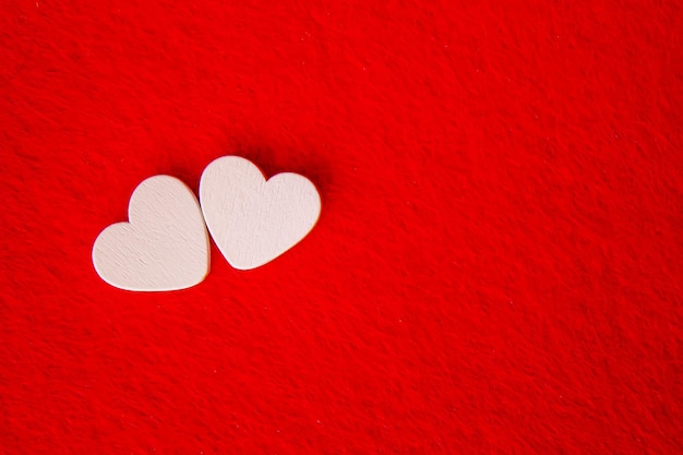 Hearts on a red background. Valentine's Day. Selective focus. Valentine.