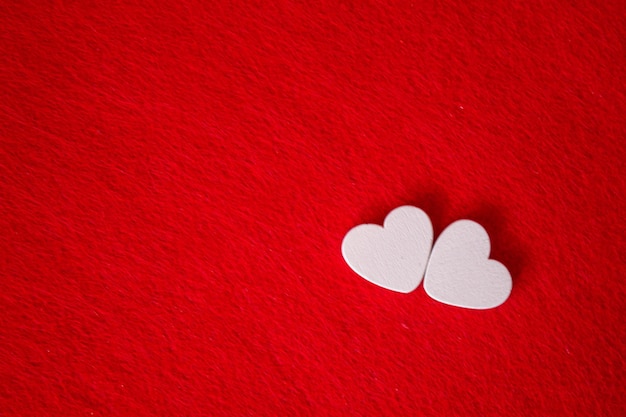 Hearts on a red background. Valentine's Day. Selective focus. Valentine.