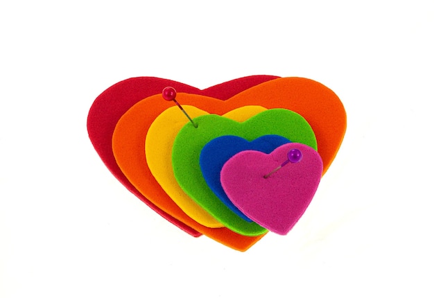 Hearts united with the colors of the lgbti flag with the concept of community and commitment