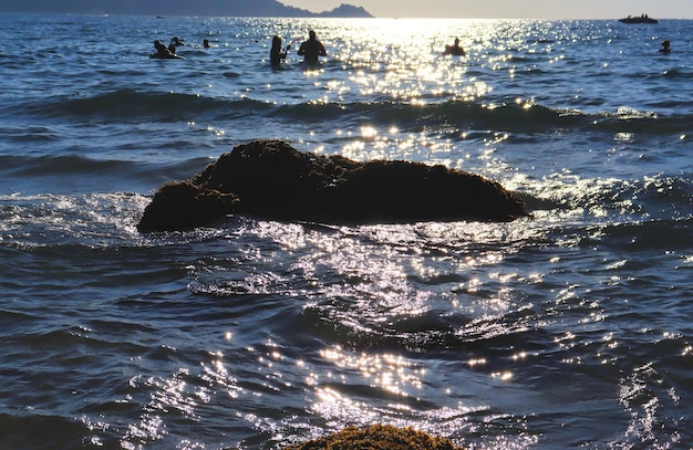 Heat at sea waves glisten in the sun beach vacation