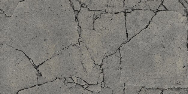 Foto marciapiede di cemento pesante rotto