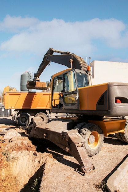 Heavy excavator for digging on day light outdoors