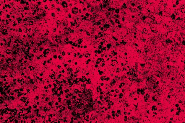 Heavy grunge texture and spots on a dark red background